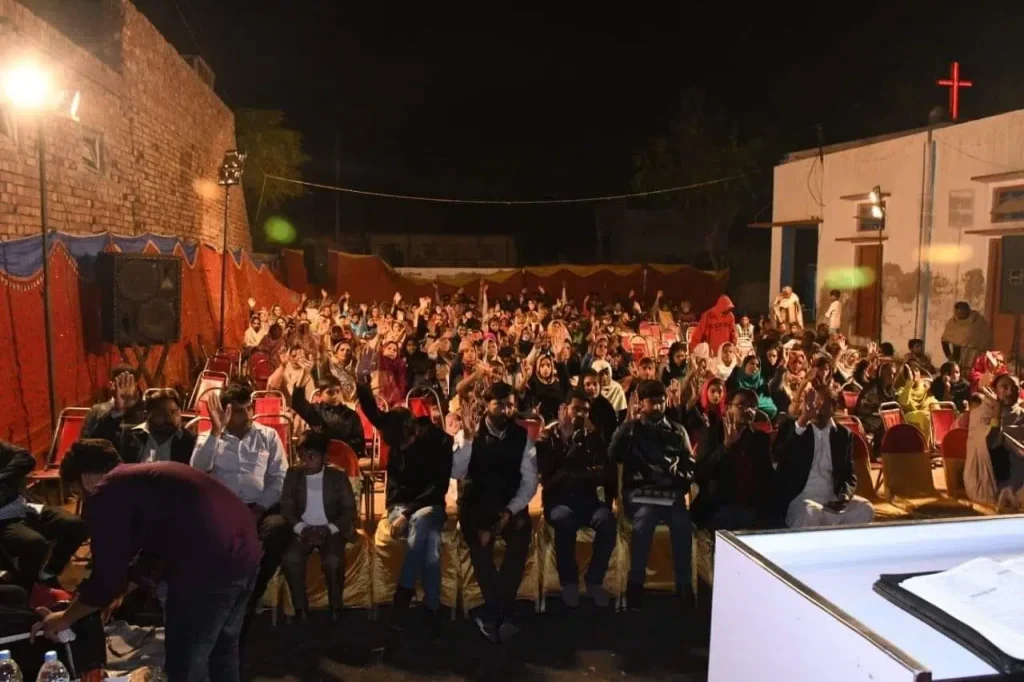 Mahmood preaching to crowds.